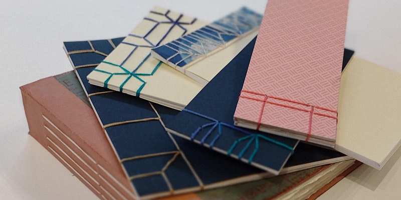 An image showing 6 beautifully bound books. The books are bound using different stitching methods and have different coloured threads and covers.